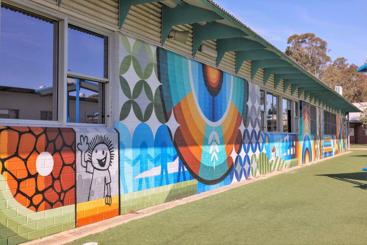 A student-designed mural painted on H block